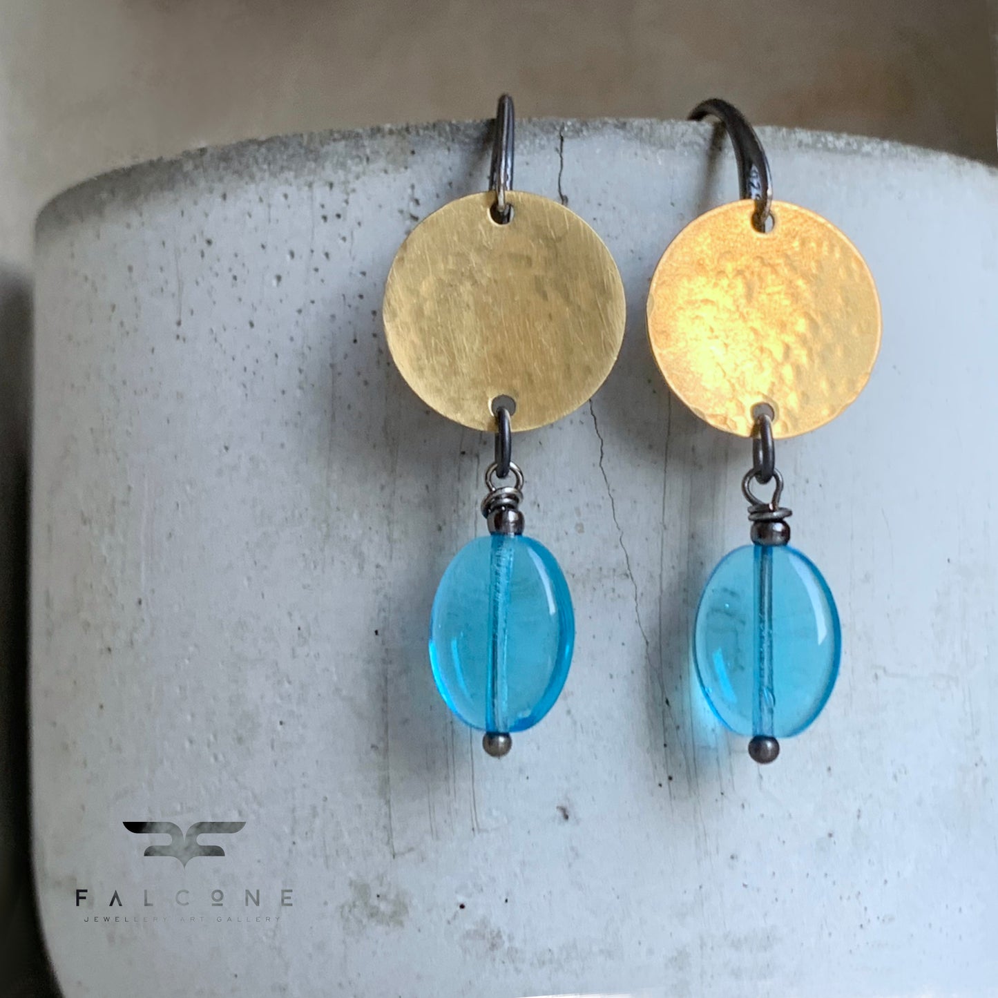 Earrings made of brass, silver, and glass 'Behind the Clouds'