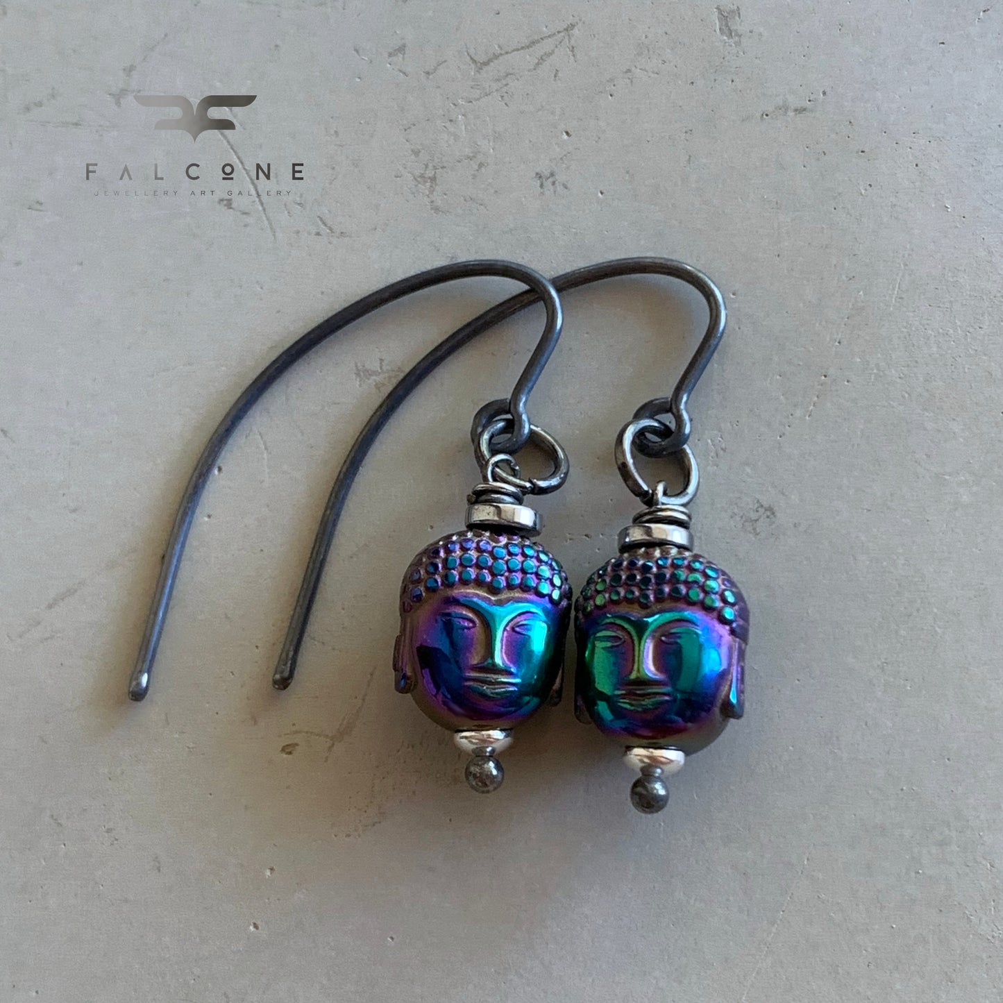 Silver earrings with carved hematites 'Zen'